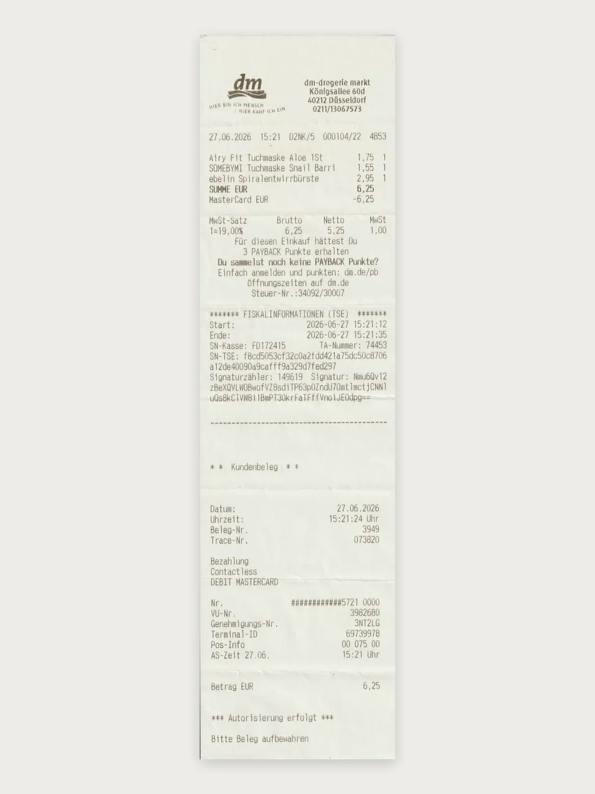 dm-drogerie markt receipt from Düsseldorf with a TSE fiscal information block and a card payment slip
